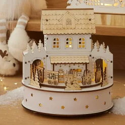 KAEMINGK Villaggio Di Natale In Legno-Paese di Natale in legno luminoso e musicale a pile (H19 cm) Casa di famiglia