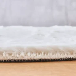 Tappeto rotondo in finta pelliccia (80 cm) Finn Bianco