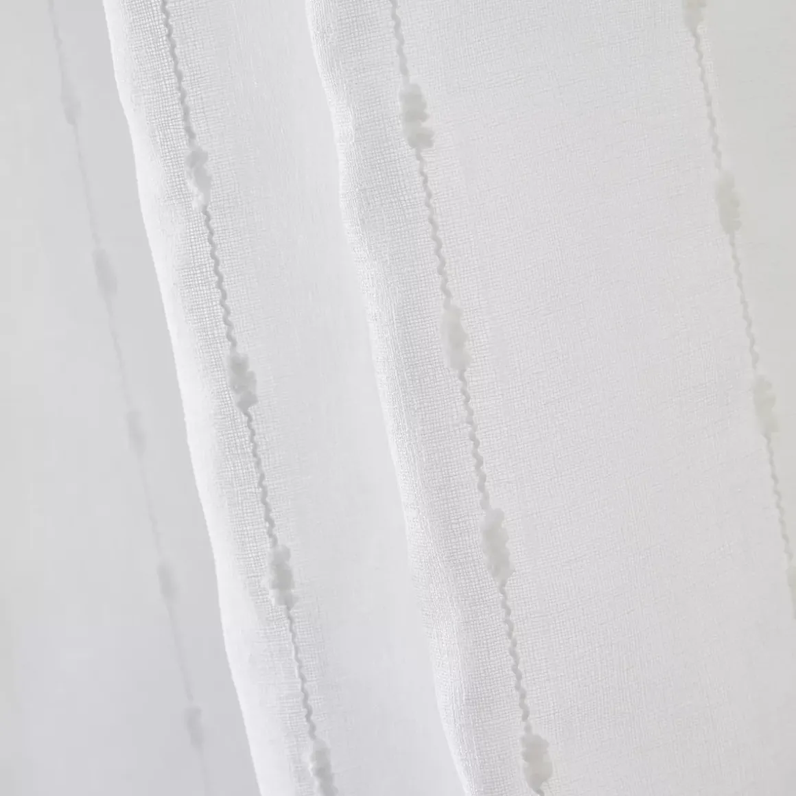 Tenda trasparente con passanti nascosti e pon pon (140 x 240 cm) Axel Bianco